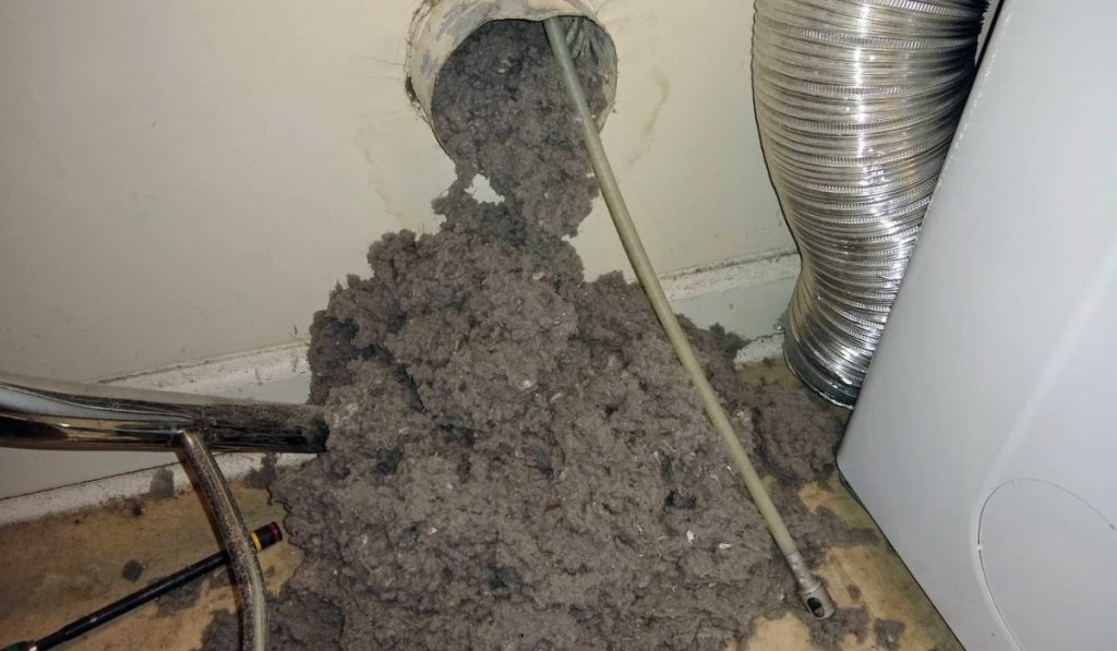 Lint removed from a clogged dryer vent during a dryer vent cleaning service in Palm Coast FL